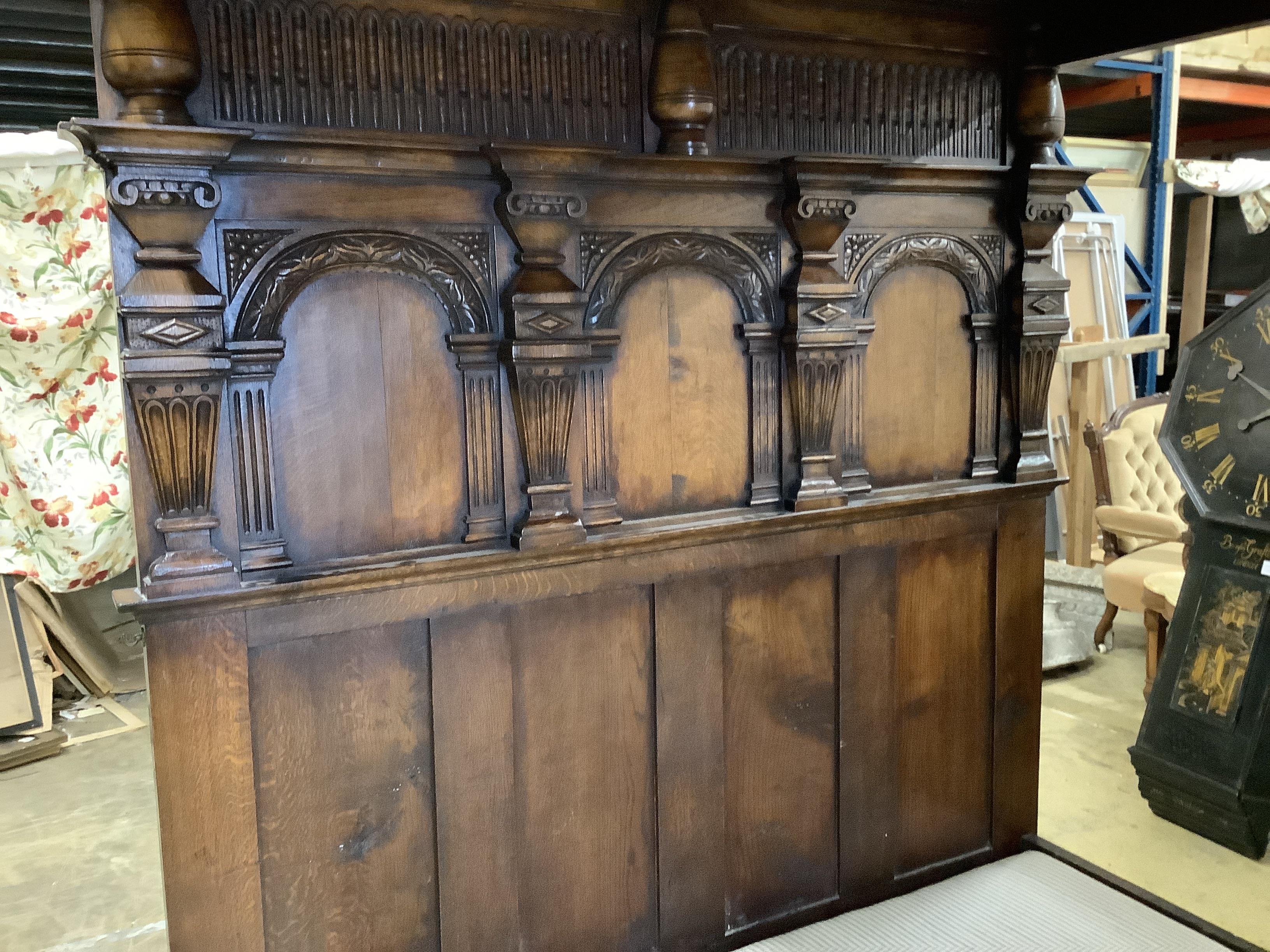 A 17th century style oak tester bed frame, width 160cm, length 218cm, height 199cm